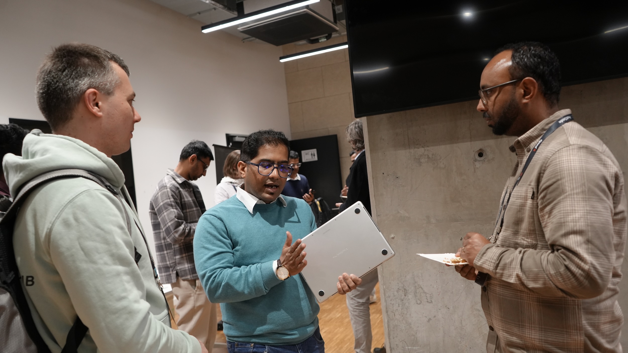 Prasad in a mentoring conversation at a community event.